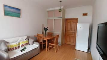 Comfort Apartment, 1 Bedroom, City View | Living area | Flat-screen TV