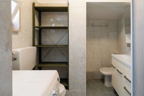 Apartment, 1 Bedroom | Bathroom | Shower, hair dryer, towels, soap