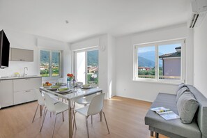 Standard Apartment, Multiple Bedrooms (Magnolia Bike & River Apartment) | Living area | 21-inch flat-screen TV with cable channels - Ulivo and Magnolia Bike & River Apartment (Arco)