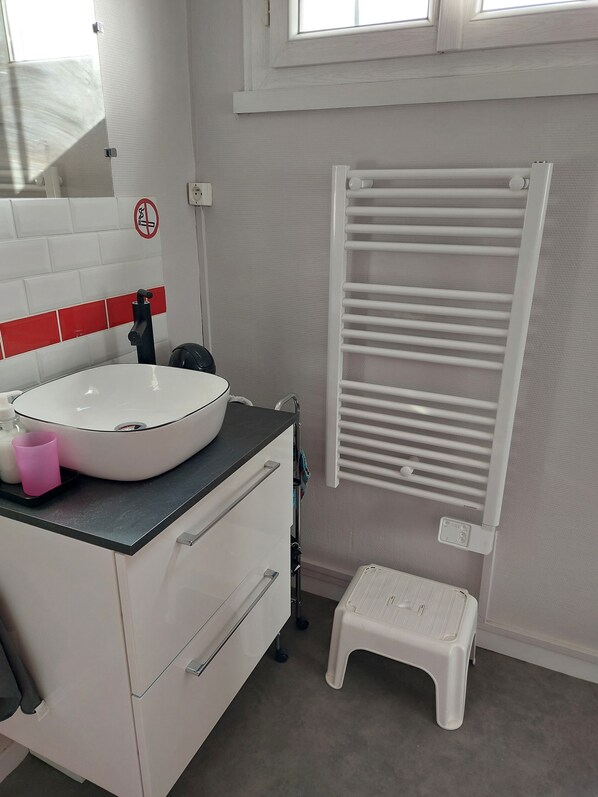 Hair dryer, towels, soap, shampoo