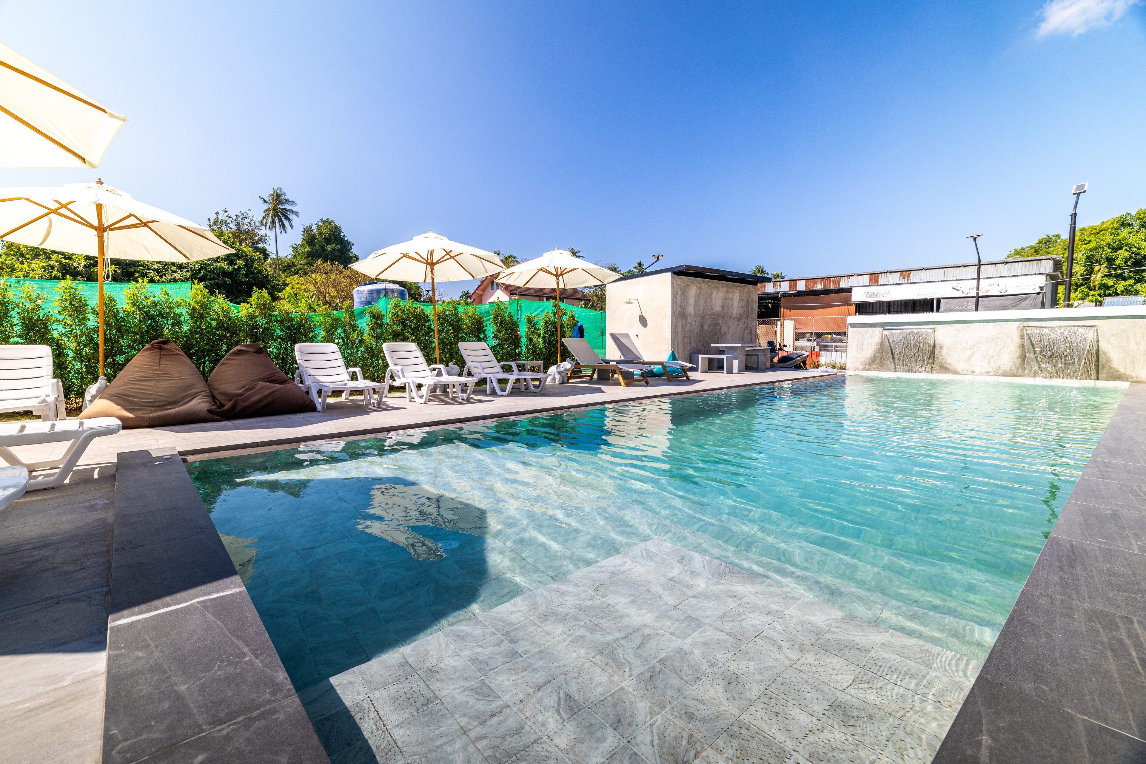 Outdoor pool, open 9:30 AM to 9:00 PM, pool umbrellas, sun loungers