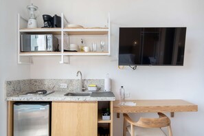 Fridge, microwave, stovetop, coffee/tea maker