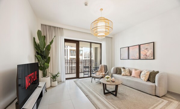 Standard Apartment, City View | Living area | 55-inch Smart TV with digital channels, Netflix, streaming services