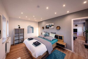 1 bedroom, desk, iron/ironing board, travel cot