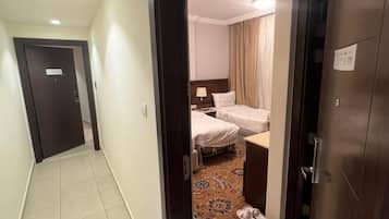 Suite familiar, vistas a la ciudad | Tabla de planchar con plancha y wifi gratis