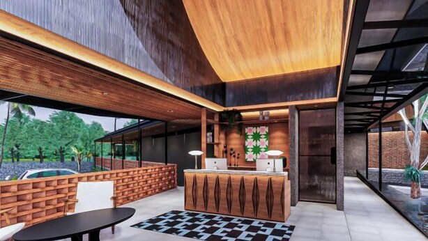 A modern reception area with a wooden reception desk, two chairs, and a large window offering a view of greenery. - Tanawana Living Borobudur (Borobudur)
