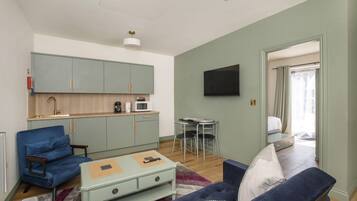Suite clásica, baño en la habitación | Lounge