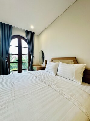 Deluxe Suite, Balcony, City View | Desk, laptop workspace, free WiFi