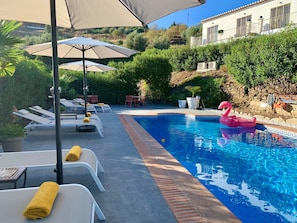 Outdoor pool, pool umbrellas, pool loungers