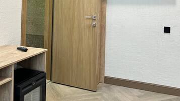 Standard Triple Room | Down comforters, desk, laptop workspace, blackout drapes