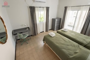 Blackout drapes, iron/ironing board, free WiFi