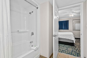 Shower, hair dryer, towels, shampoo