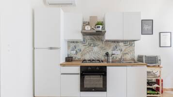 Apartment, 2 Bedrooms | Private kitchen | Fridge, oven, stovetop, espresso maker