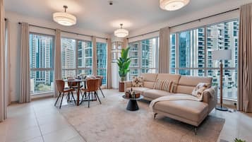 Deluxe Apartment, 1 Bedroom, Canal View | Living area | 46-inch flat-screen TV with satellite channels, Netflix