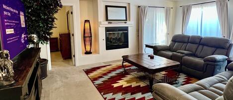 Smart TV, fireplace, books, offices