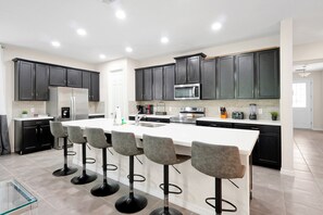 Fridge, microwave, oven, stovetop - Magical 5 star Home w/ pool, Gaming & Theatre (Kissimmee)