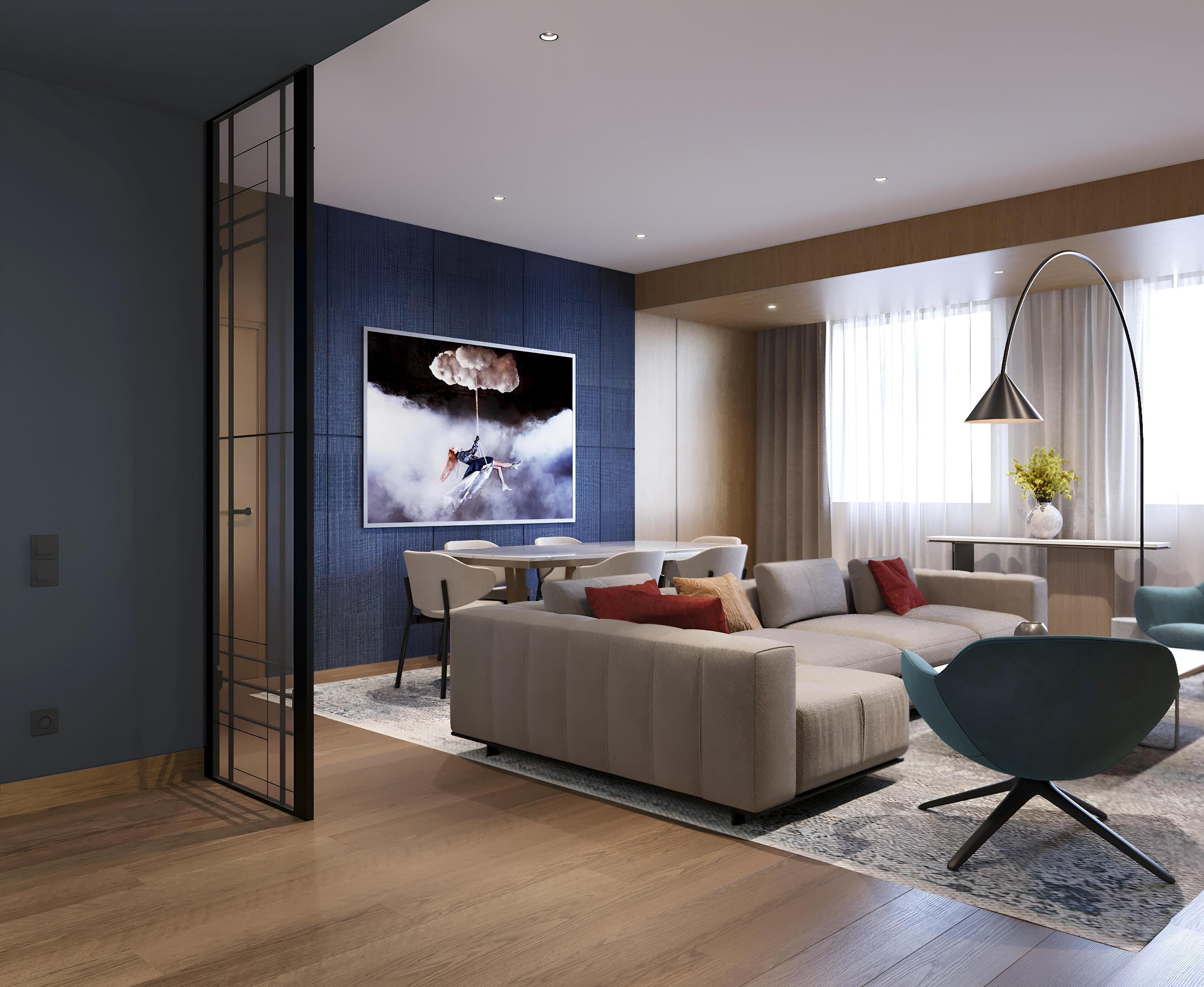 A modern living room with a sectional sofa, a dining area, and a large artwork on the wall.