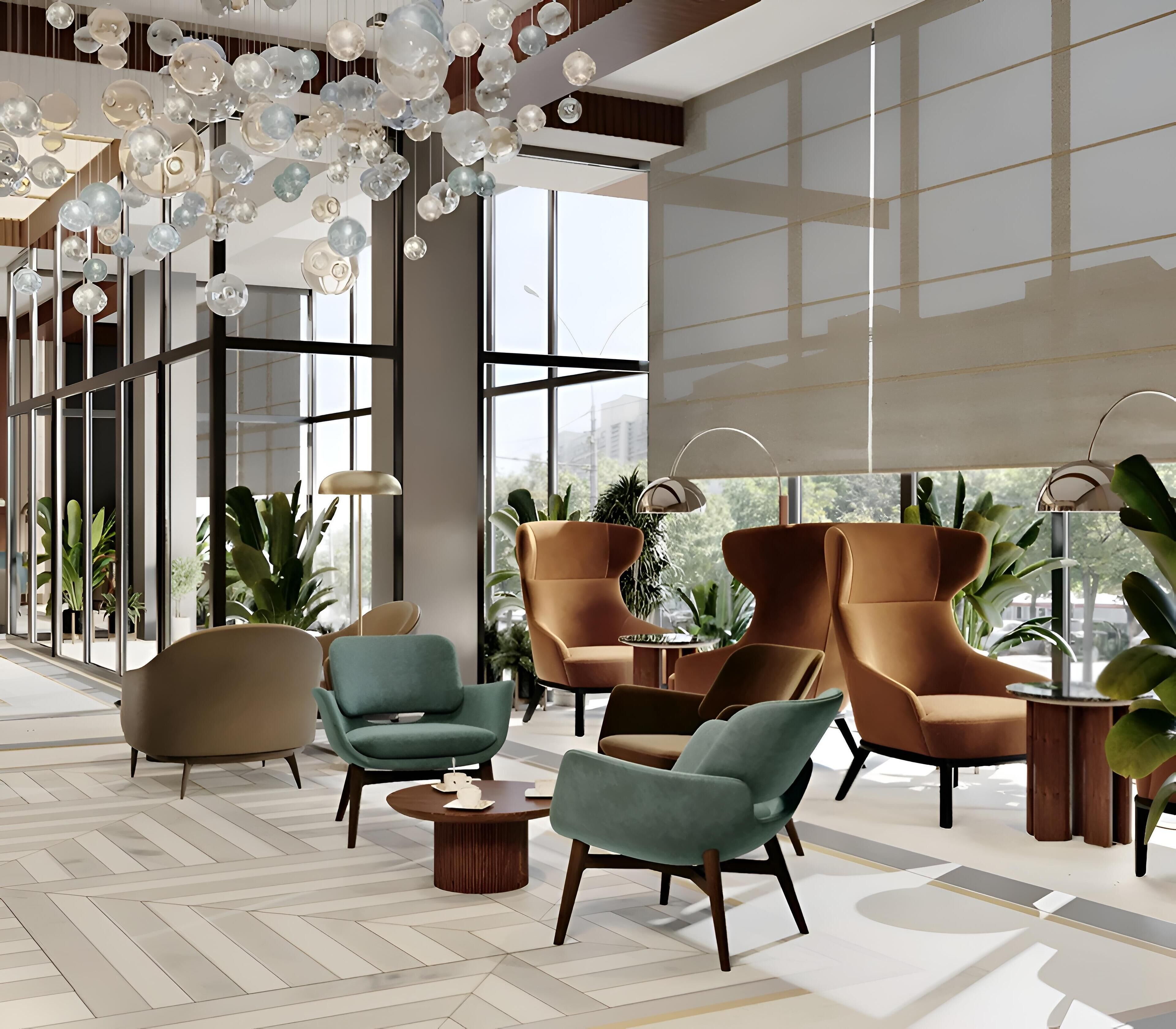 A spacious lobby with modern furniture, large windows, and decorative lighting.