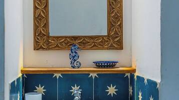 Shower, towels, soap, toilet paper