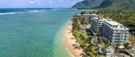On the beach, sun-loungers, beach towels
