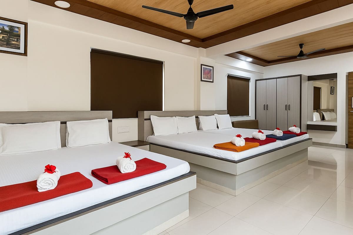 Family Quadruple Room, Pool View | Laptop workspace, free WiFi