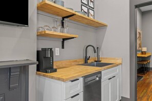 Fridge, microwave, stovetop, coffee/tea maker