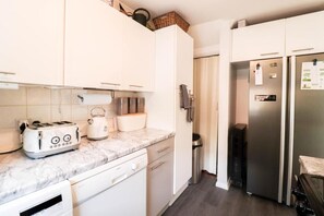Apartamento, 2 quartos, varanda, vista para o jardim | Parte interna