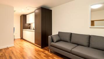 Deluxe appartement, 1 slaapkamer | Woonruimte