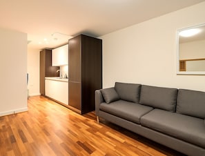 Deluxe-Apartment, 1 Schlafzimmer | Wohnbereich