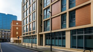 A modern building with large windows and a flat facade. - Still Life Moorgate Deluxe (London)