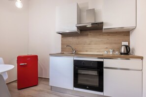 Apartment, Patio, Garden View | Private kitchen | Fridge, oven, stovetop, espresso maker