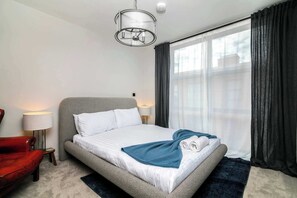 2 dormitorios, tabla de planchar con plancha, Internet y ropa de cama