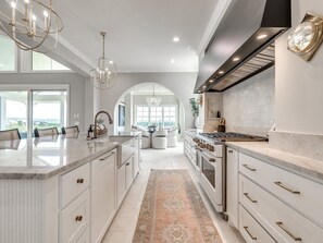 Fridge, coffee/tea maker, toaster, cookware/dishes/utensils