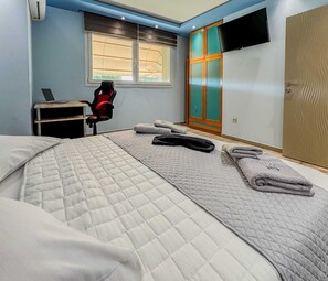 4 dormitorios, escritorio, tabla de planchar con plancha y wifi gratis