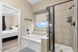 Shower, hair dryer, towels, shampoo
