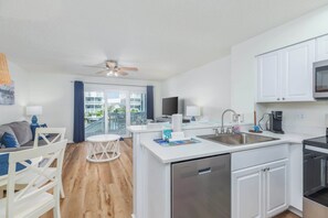 Fridge, microwave, oven, stovetop - Canal Front Condo with Pool (Ocean City)