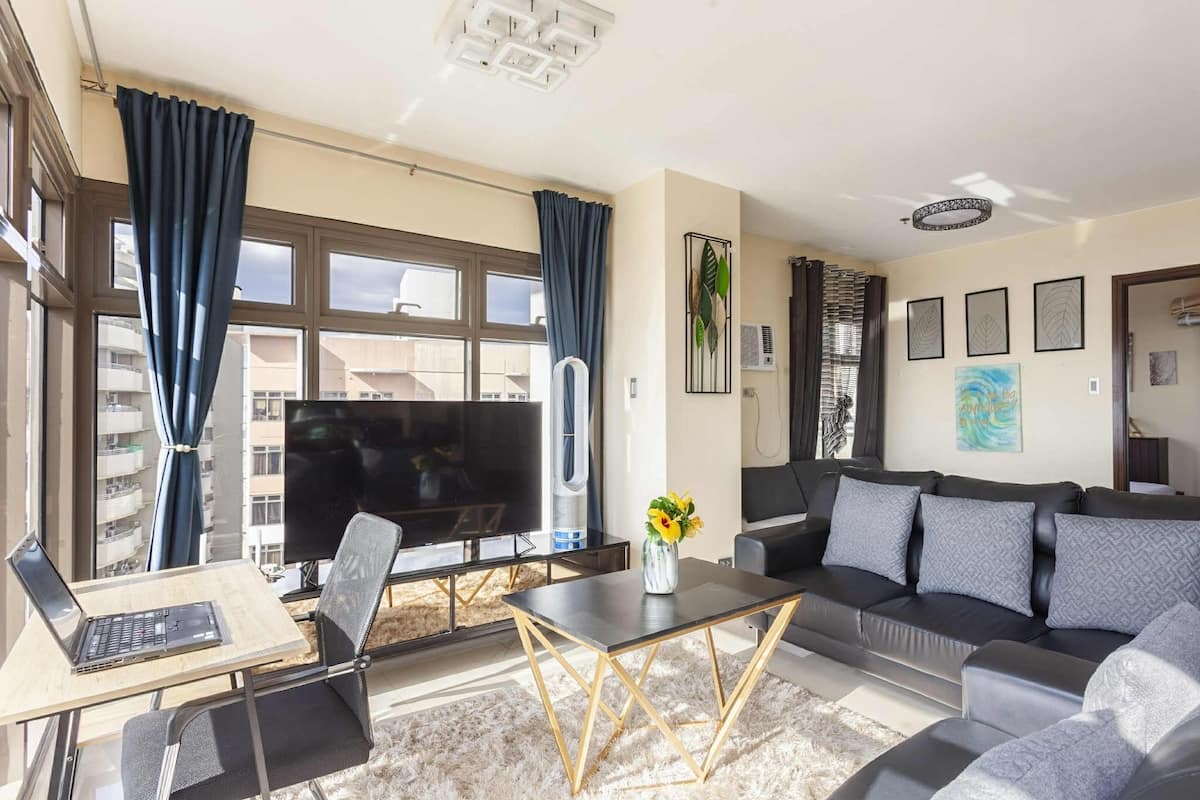 Signature Apartment, 1 Bedroom, Pool Access, Pool View | Living room | 50-inch Smart TV with digital channels