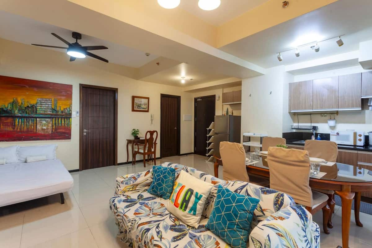 Executive Apartment, 1 Bedroom, Pool Access, Pool View | Living room | 50-inch Smart TV with digital channels