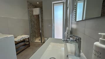 Deluxe Apartment, 1 Queen Bed with Sofa bed, Balcony | Bathroom | Shower, hair dryer, bathrobes, towels