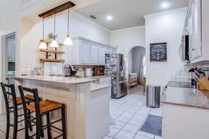 Microwave, oven, stovetop, dishwasher - Cozy 4 bedroom home with fully stocked kitchen and plenty of space! (Lubbock)