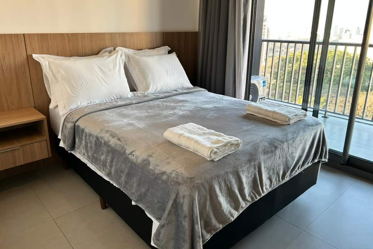 Premium bedding, laptop workspace, free WiFi, bed sheets