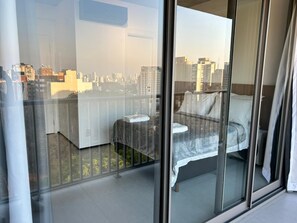 Premium bedding, laptop workspace, free WiFi, bed sheets
