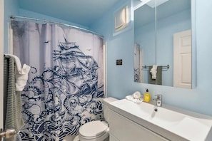 Shower, hair dryer, towels, shampoo