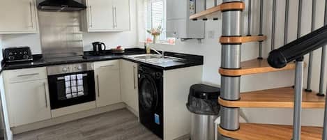 Refrigerador, microondas, horno, placa de cocina