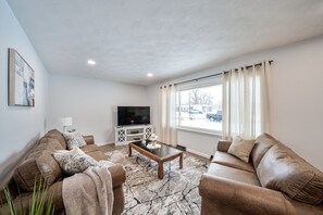 Smart TV, fireplace, books