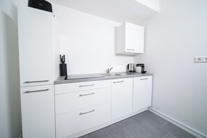 Suite, 1 Schlafzimmer, Küche | Eigene Küche | Kühlschrank, Ofen, Herdplatte, Geschirrspüler