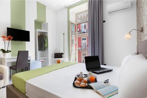 Standard Triple Room, Balcony, City View | Desk, laptop workspace, free WiFi