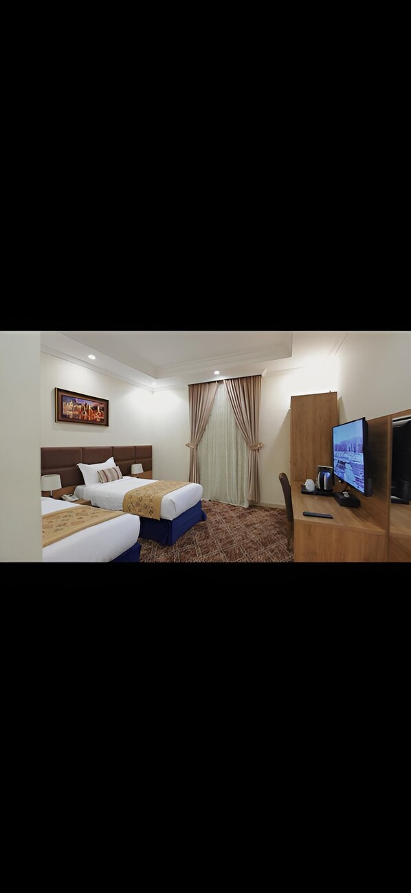 Double Room, City View | Premium bedding, down comforters, Select Comfort beds, minibar