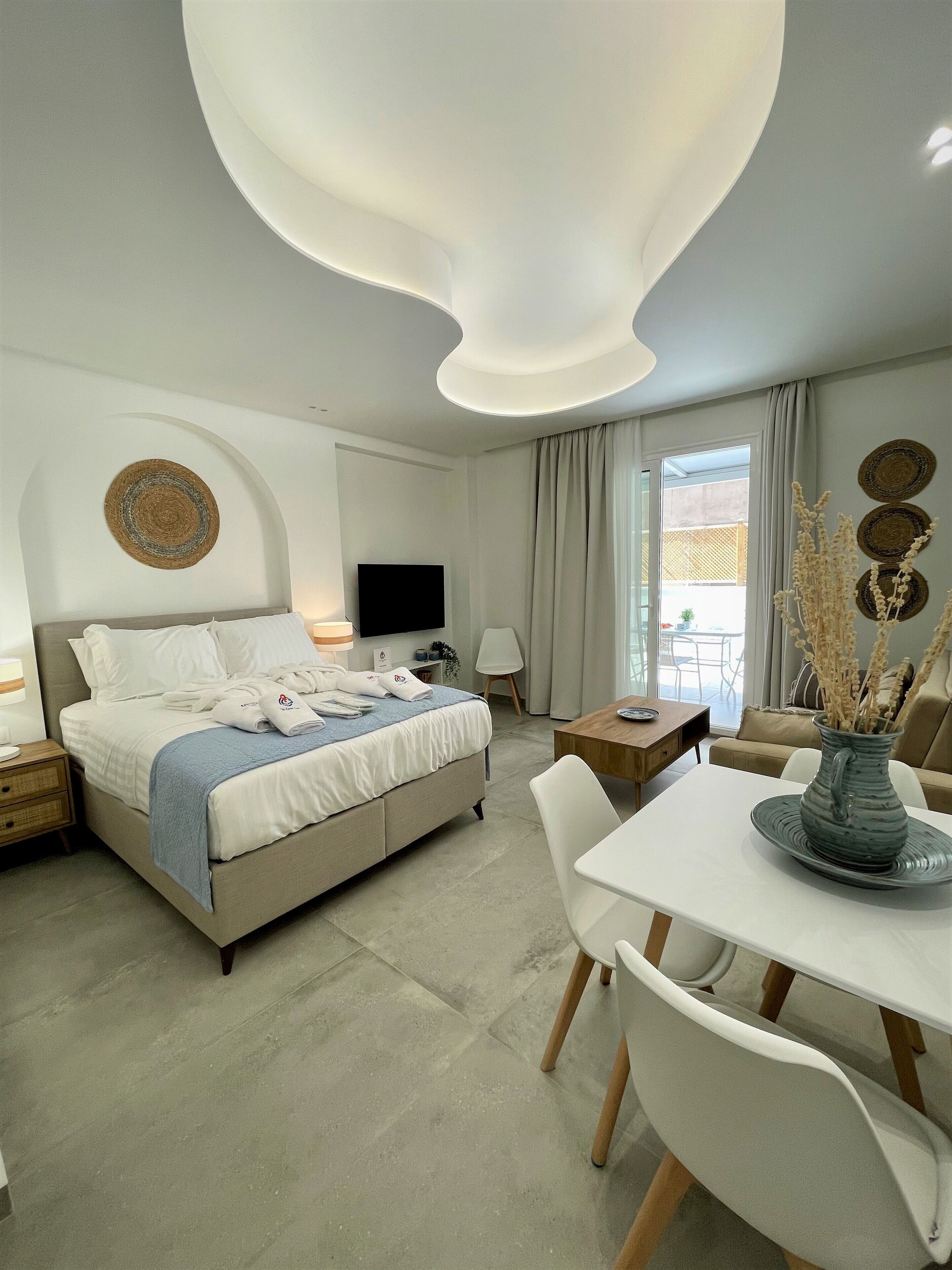 Suite with Balcony - Mykonos | Egyptian cotton sheets, premium bedding, in-room safe, laptop workspace