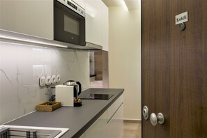 Suite with Balcony - Kohili | Private kitchenette | Microwave, stovetop, espresso maker, electric kettle